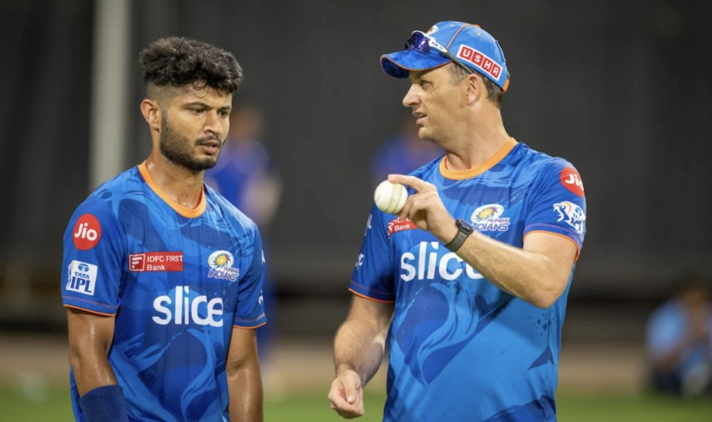 Arshad Khan and Shane Bond